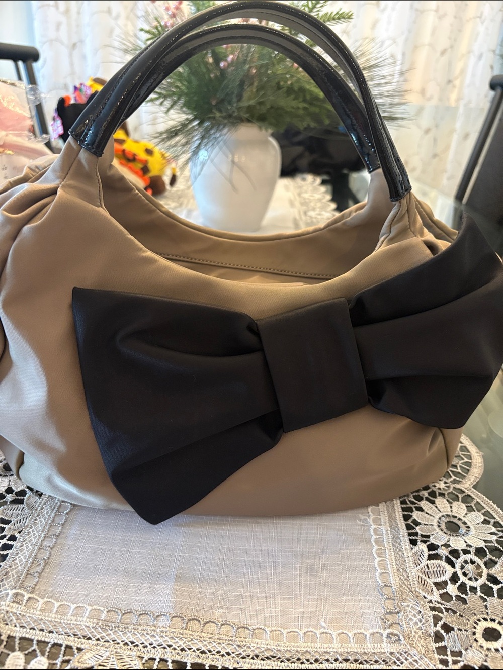 kate spade beige satchel with black bow